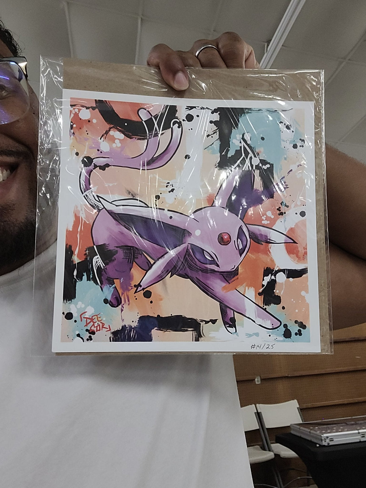 Deante Howard holding the Espeon 8x8 art print
