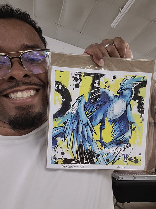 Deante Howard holding the Articuno 8x8 art print