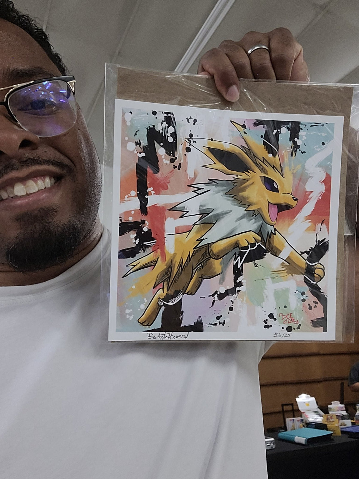 Deante Howard holding the Jolteon 8x8 art print