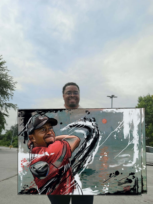 Deante Howard holding the Tiger original