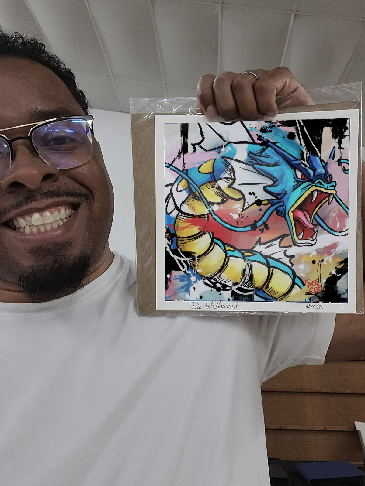 Deante Howard holding the Gyarados 8x8 art print